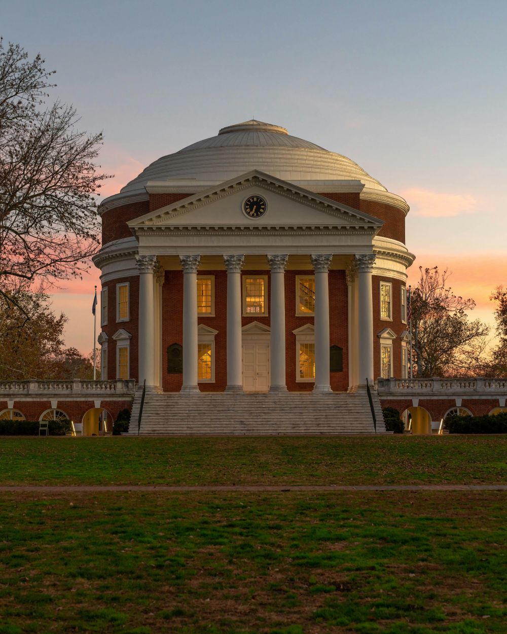 VERVE Charlottesville girl sitting in car smiling while taking a bit of pizza
