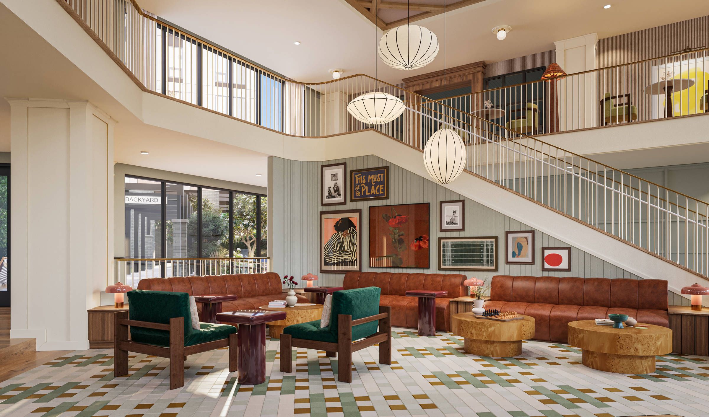 Modern hotel lobby with brown sofas, green chairs, round tables, artwork, and large globe pendant lights.